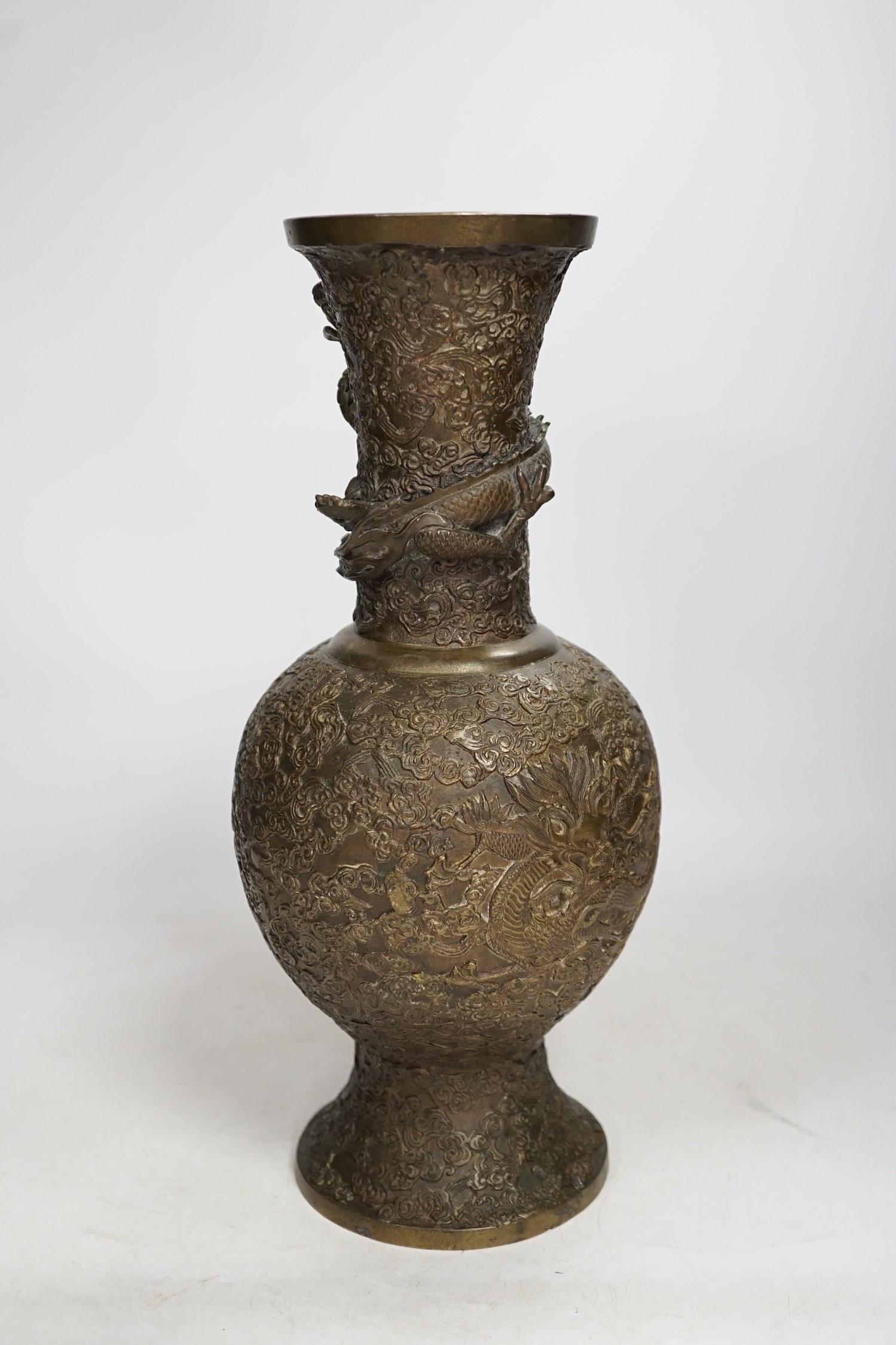 A 19th century Chinese or Japanese bronze ‘dragon’ vase, 33cm. Condition - fair